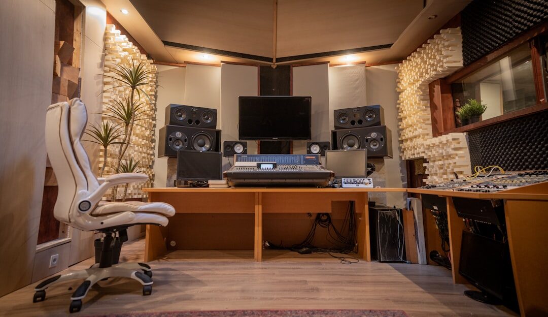 TV studio control room with multiple broadcast monitors and a director overseeing a live show